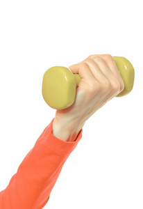 用哑铃锻炼妇女的手, 积极健康的生活方式概念