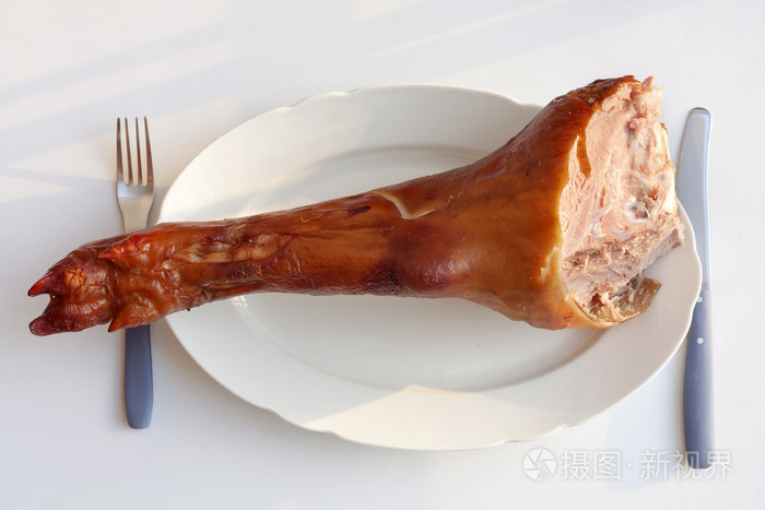 大猪腿沉重的不健康饮食概念