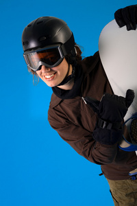 单板滑雪装备的女人图片