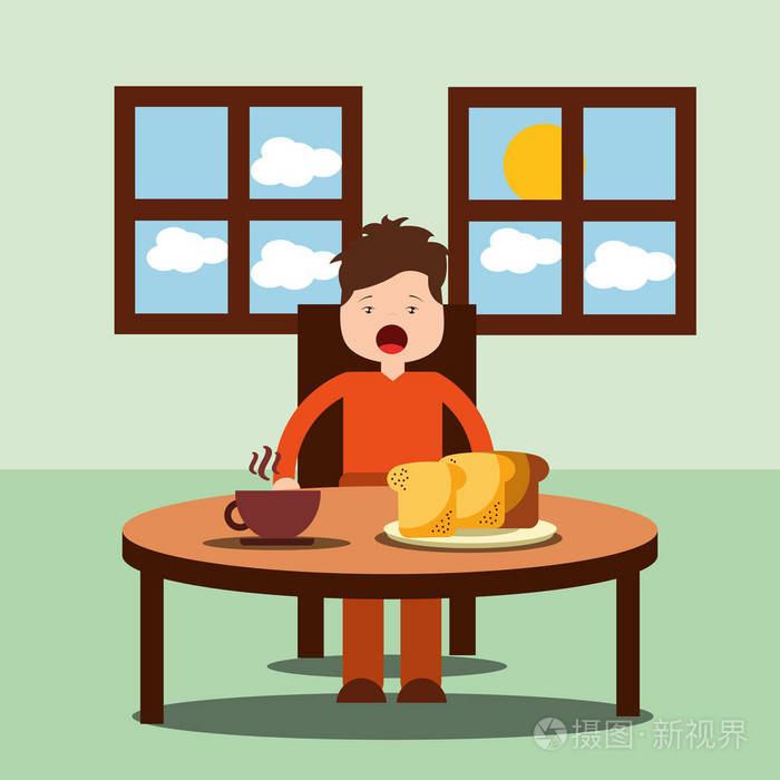 男孩高兴早晨吃早餐