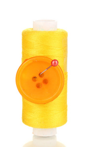 黄色筒子用针和孤立在白色的按钮