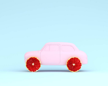 柚子布局车轮和汽车粉红色的粉彩蓝色背景。最小的想法食物和果子概念。创意, 在广告营销沟通中产生工作。经营理念