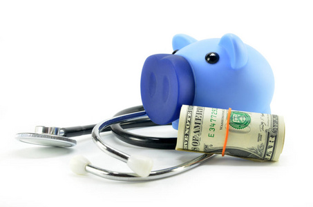 听诊器和储钱罐显示医疗或金融概念