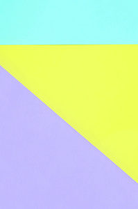纹理背景的时尚粉彩色彩。紫罗兰色黄色和蓝色几何图案纸。最小抽象