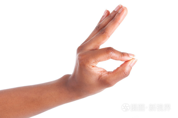 女人的手打手势-显示 ok 的手势的特写