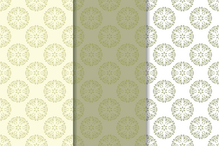 橄榄绿色和白色的花卉背景。纺织品和墙纸的无缝图案集