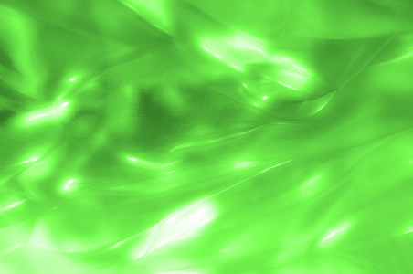 豪华绿色背景设计流动的波浪与闪耀光