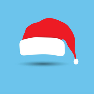 一个红色的圣诞老人帽子。圣诞节和新年配件查出的蓝色背景
