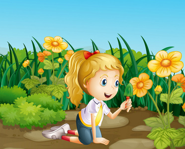一个女孩在花园里拿一把铲子