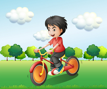 一个快乐的年轻人骑自行车