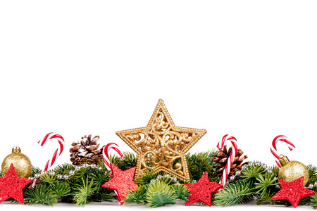 圣诞边框树枝与黄金球 糖果和孤立在白色的大明星