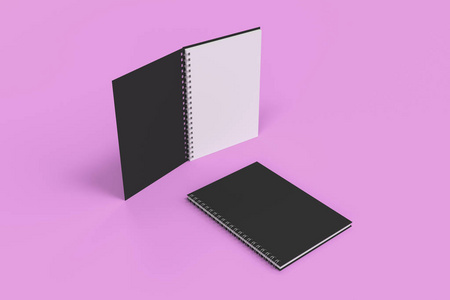 两个笔记本与螺旋装订上紫色背景