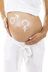 一名孕妇与标记在她的胃男孩和女孩的画像
