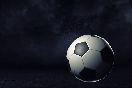 3d. 在明亮的聚光灯下, 在黑暗背景下单个足球球的渲染
