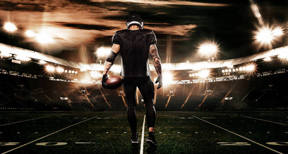 美国橄榄球运动员球员在体育场。体育横幅和壁纸与 copyspace