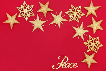 圣诞节抽象背景与金色闪光摆设装饰和和平标志红色与复制空间。圣诞佳节传统节日贺卡