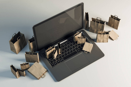 在灰色背景下, 带有小购物袋的空笔记本电脑。网上购物和电脑概念。模拟, 3d 渲染