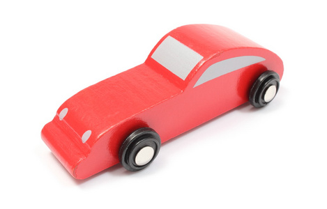 孤立在白色背景上的红色玩具车