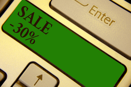 概念手写显示销售30。商业照片文本一个项目的促销价格在30 降价键盘绿色键创建计算机计算反射文档