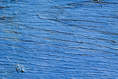 用蓝色颜料画的旧木面板