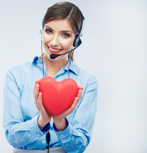 女人电话中心操作员持有爱标志的情人节。r