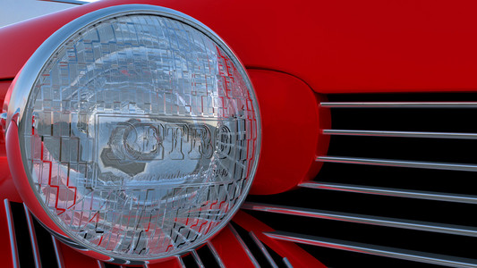 红色复古车的大灯图片
