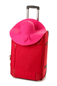 与女人的帽子上白色孤立的红色手提箱