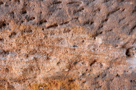 老沙子石头石灰岩石背景。质感的墙壁。背景