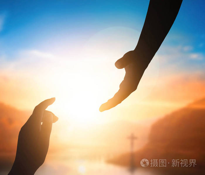 世界和平日概念: 耶稣伸出手的剪影
