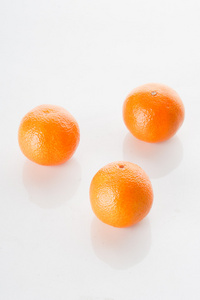 nrbild av tre frska mandariner