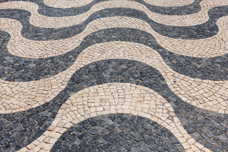 Typical Portuguese cobblestone handmade pavement calada