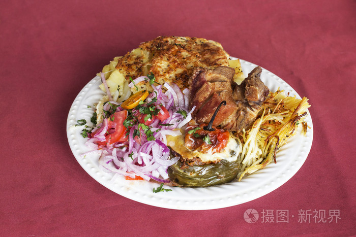 秘鲁菜:来自阿奎帕的酒杯. 炸猪(chicharron)
