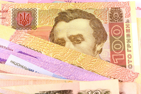 美元欧元格里夫纳汇率钞上木制背景