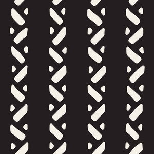 手牵引的式民族无缝模式。在黑色和白色抽象几何平铺背景