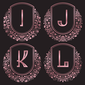玫瑰在古董样式中设置的金质字母。老式的标志我，J，K，L 字母