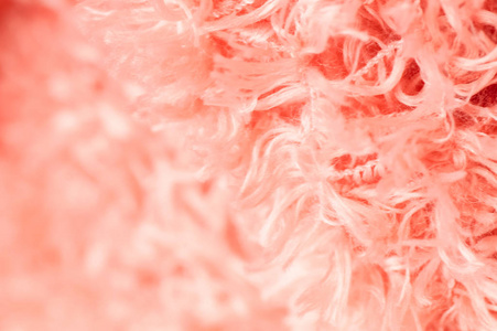 关闭了柔软的粉红色纯棉地毯和抽象背景