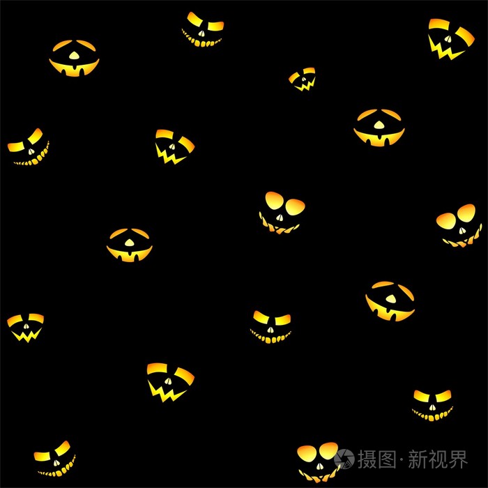 橘黄色照亮笑脸在黑色背景上的万圣节