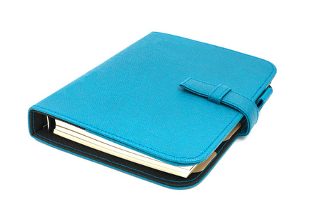 孤立在白色背景上的蓝色皮革业务日记