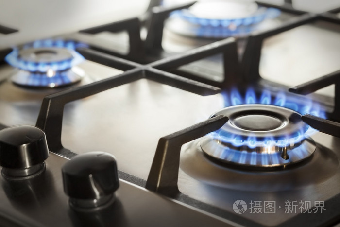 用燃烧的火丙烷气厨房燃气灶具