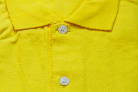 黄色运动衫折叠纹理和背景图片