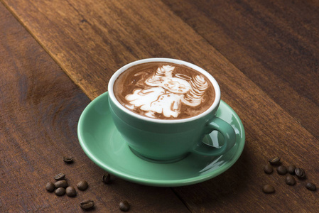 可可粉在咖啡拿铁上做的天使