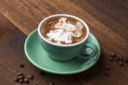 可可粉在咖啡拿铁上做的天使图片