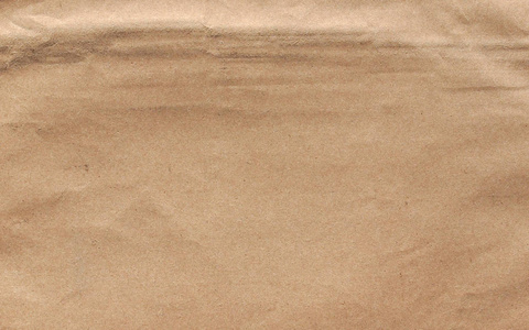 轻型的棕色纸表面有用作为背景