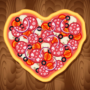 意大利辣香肠比萨饼上木桌背景的心形状中。食物为情人节晚会和浪漫的约会。情人节那天的比萨饼交付概念