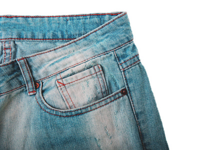 粗斜纹棉布牛仔裤背景与煤层的牛仔裤时尚设计