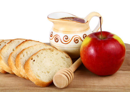 水壶里的蜂蜜和船上的苹果面包图片