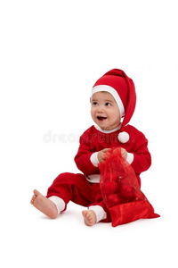 穿着圣诞老人服装的快乐小男孩