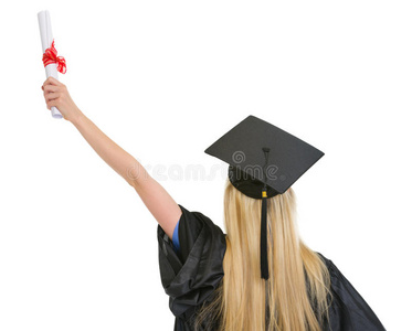 穿着毕业礼服的女人欢庆成功图片