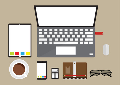 顶视图的办公桌与笔记本电脑平板电脑手机咖啡