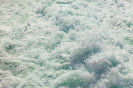 蓝白色的海洋水波泡沫抽象背景图片